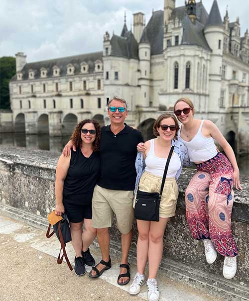 Tim in France with his wife Julie and daughters Bea and Alice